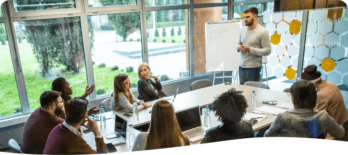 Manager asking a group about employee turnover