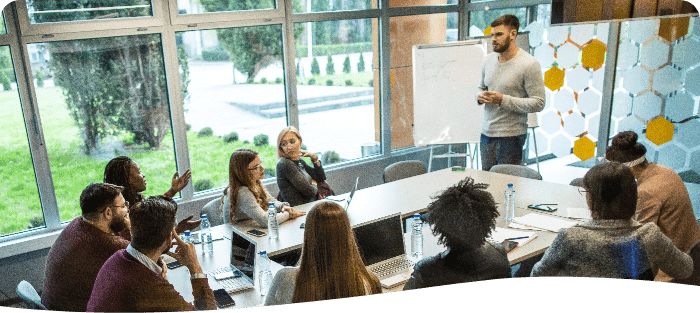 Manager asking a group about employee turnover