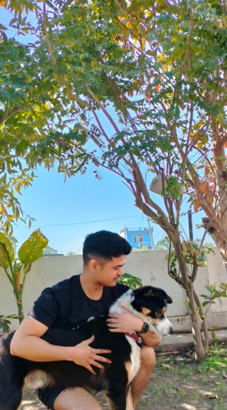 man-outside-with-dog