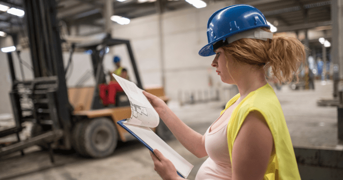 pregnant woman working construction