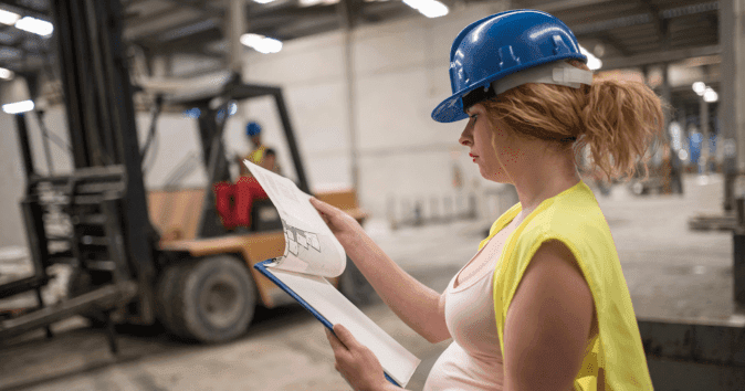 pregnant woman working construction