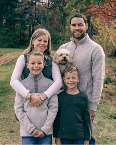 Miguel with wife, two sons and their dog