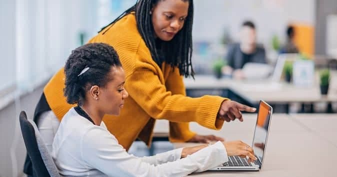 manager providing personalized training and development to an employee, highlighting the value of ongoing learning and growth opportunities in the workplace