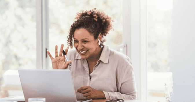 an employee doing fun virtual team building activity