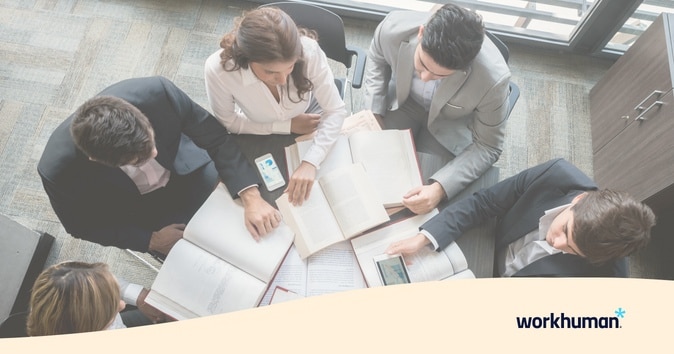 employee-sharing-insights-with-team-1.jpg