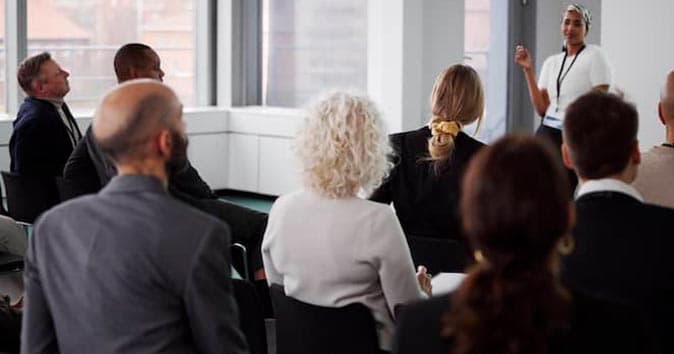 small group of people attending the office session