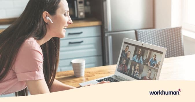 high-performing team members feel happy and smiling during a zoom meeting