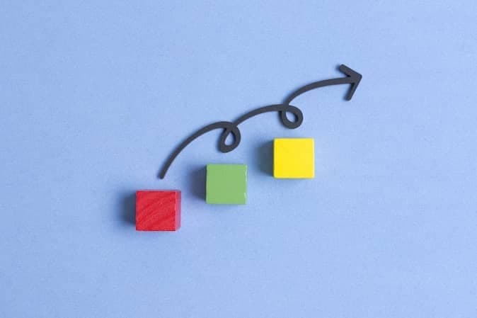 color blocks with arrow going in upward direction