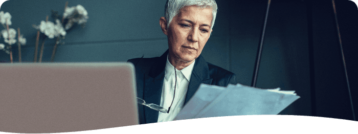 woman reviewing some papers