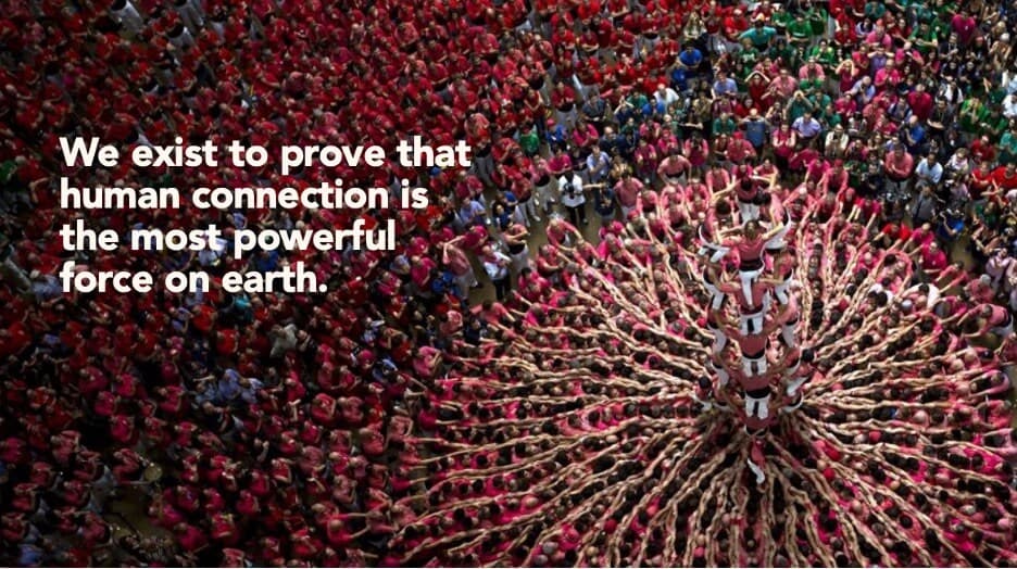 Image of a crowd with a quote overlayed that reads "We exist to prove that human connection is the most powerful force on earth."