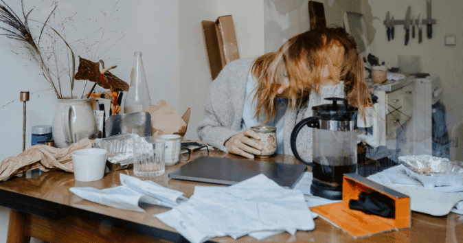 woman exhausted at desk
