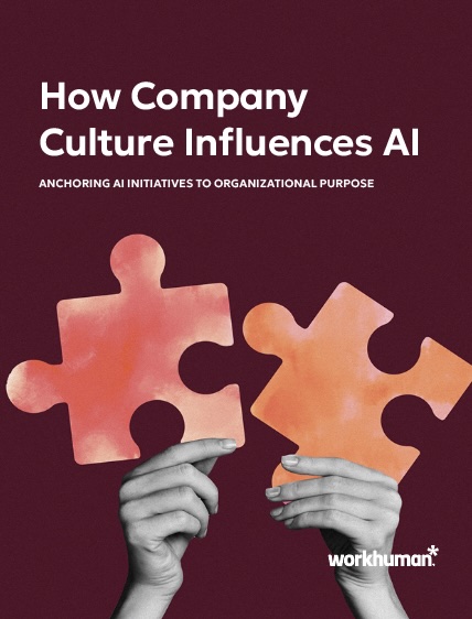 A pair of hands holding two interlocking puzzle pieces against a dark maroon background. The text above reads "How Company Culture Influences AI," and below that it states "ANCHORING AI INITIATIVES TO ORGANIZATIONAL PURPOSE" along with the Workhuman logo.