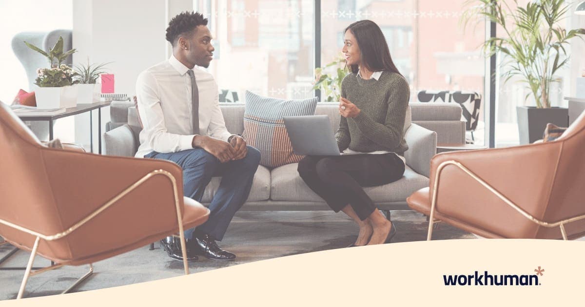 two employees discussing human resource management