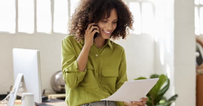 woman discussing her benefits certification