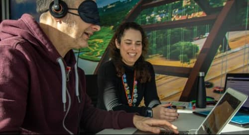 woman facilitates website usability testing with a man