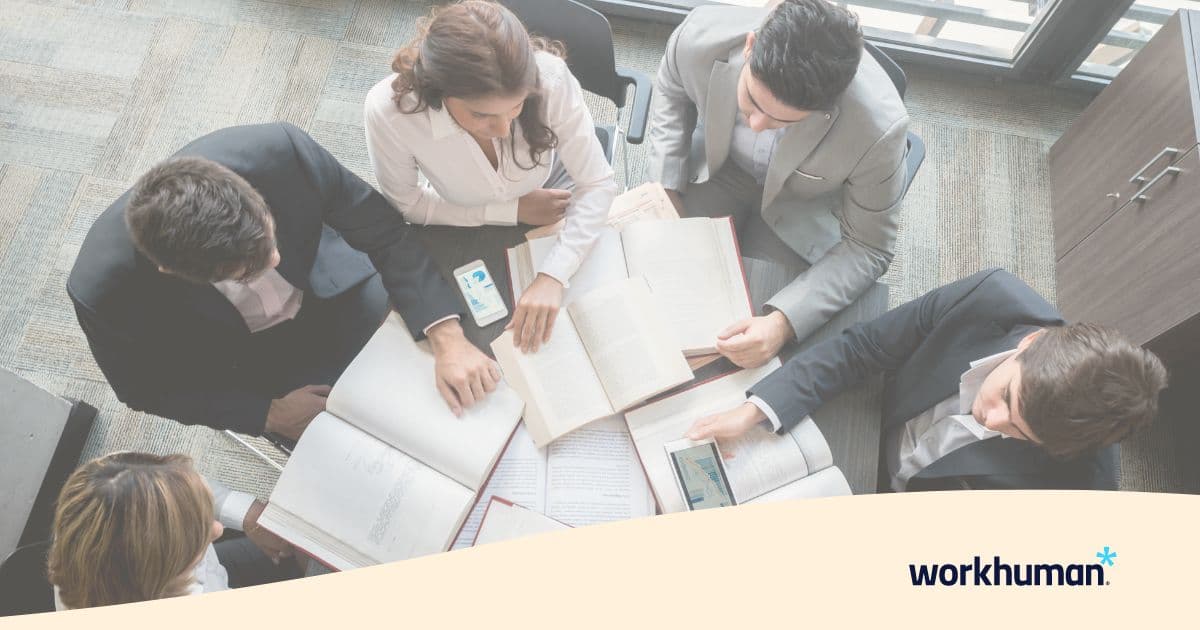 employee-sharing-insights-with-team.jpg