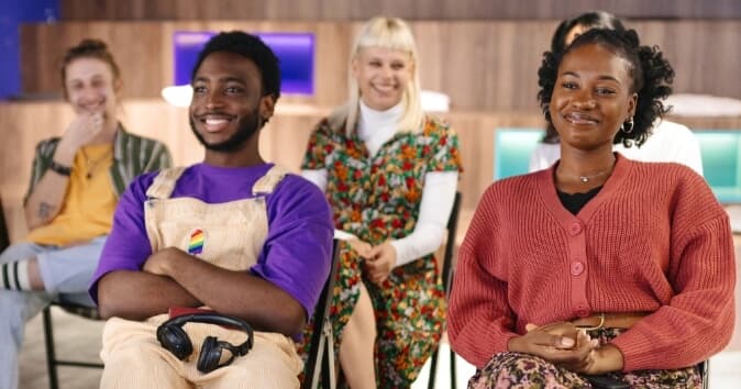 Group of people smiling.