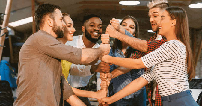 team members doing activities in office