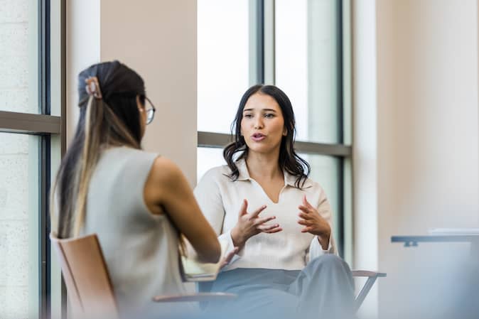 employees talking to each other