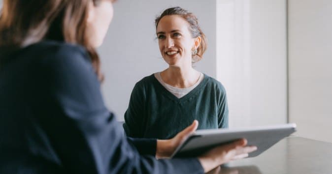 woman sends an employee satisfaction survey to collect data for actionable insights