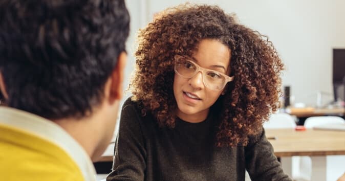 Man and woman talking.