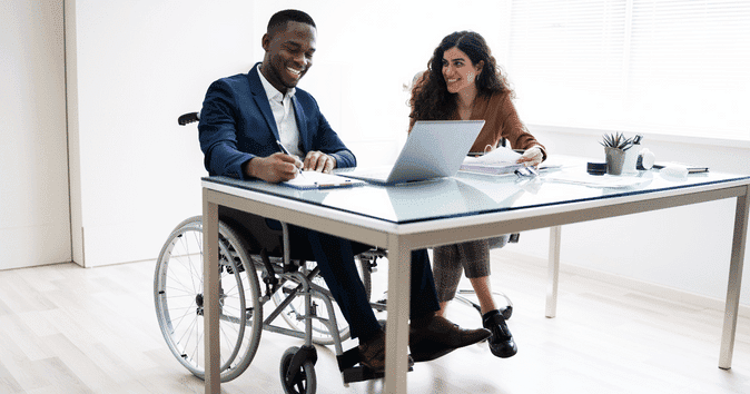 employee showing sample recognition letters to teammate