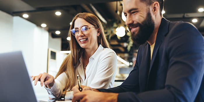 manager and employee working on development planning