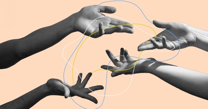 Hands playing with strings.