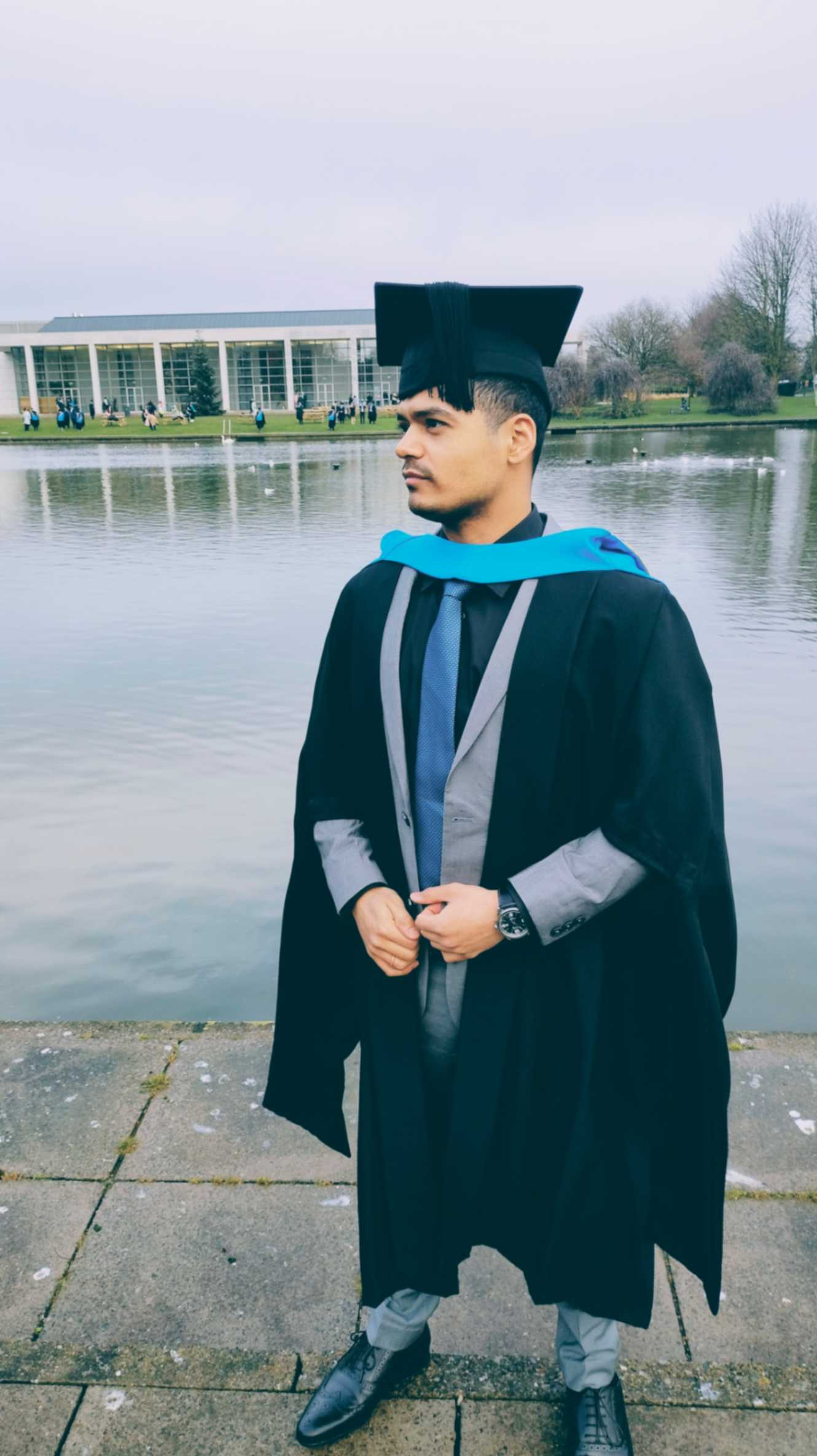 adi-outside-lake-at-graduation