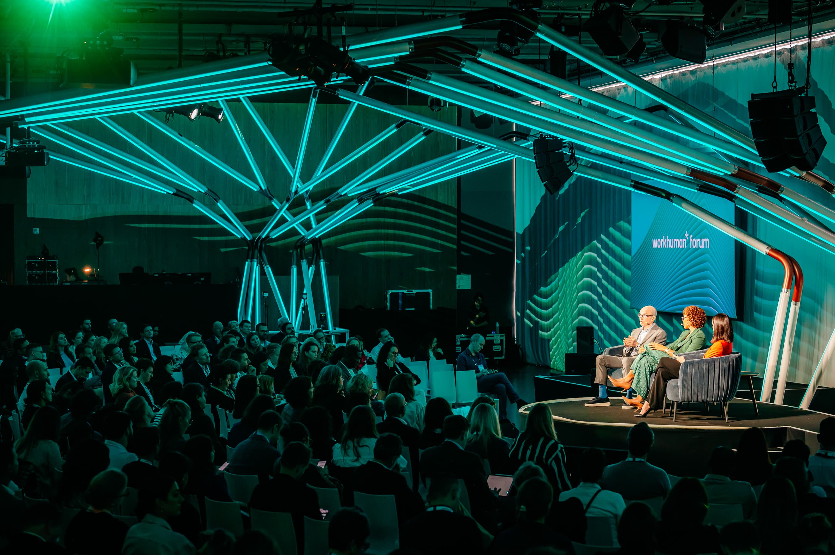 Workhuman forum showing stage, speakers, and crowd