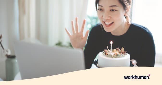 An employee having a virtual holiday party with her team