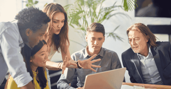 A-group-of-employees-in-a-brainstorming-session-in-a-startup-company-showing-good-performance-and-productivity