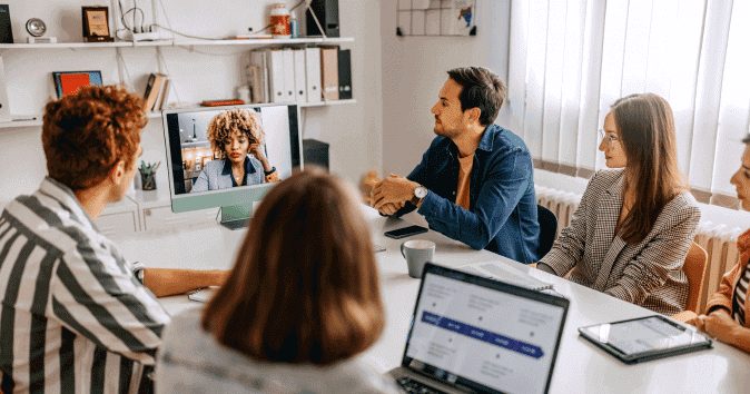 team members in hybrid meeting