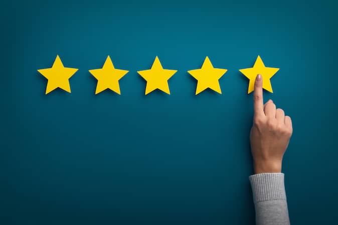 hand giving a star rating