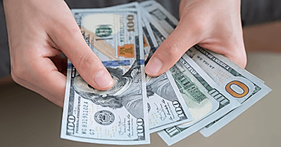 hands holding money