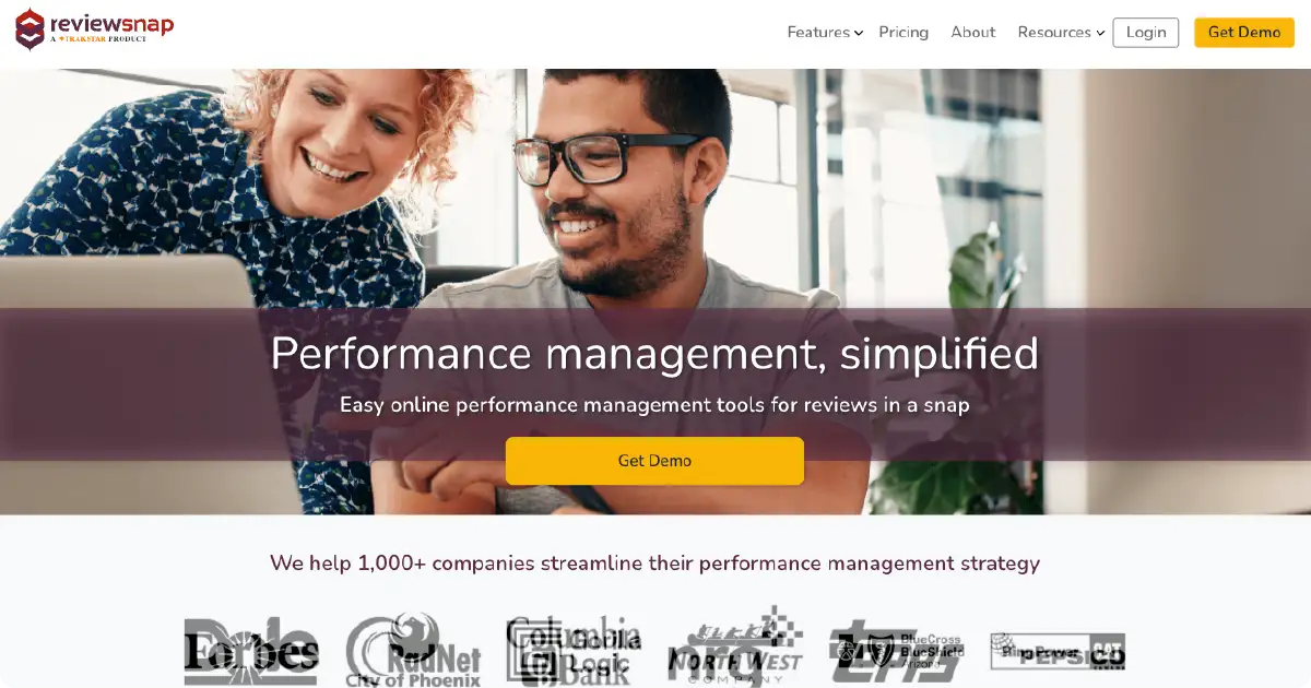 ReviewSnap performance management homepage highlighting simplified employee review tools, demo CTA, and trust indicators showing usage by 1,000+ companies.